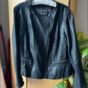 Black leather jacket. Never worn 18w